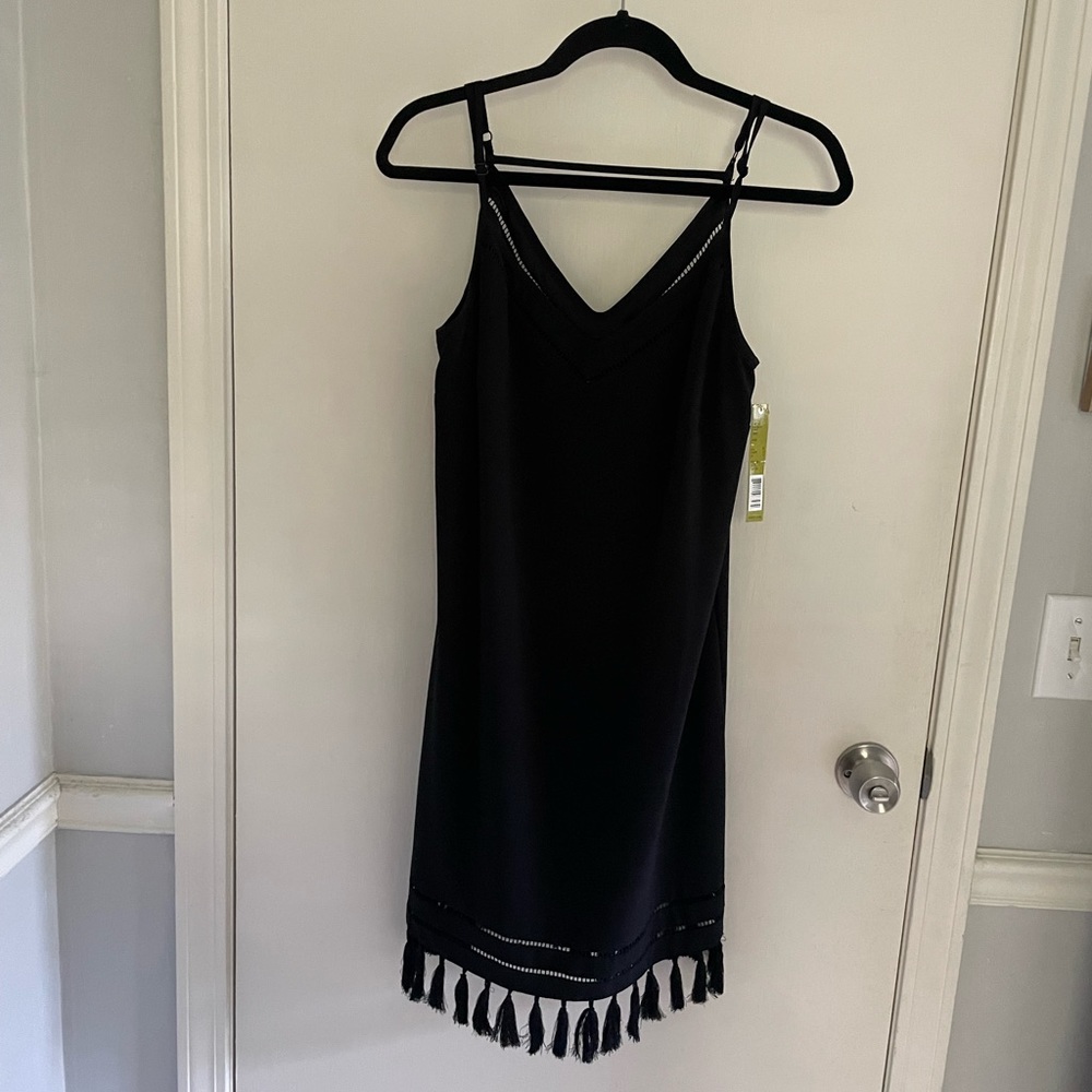 LBD - black dress with fun details at the bottom